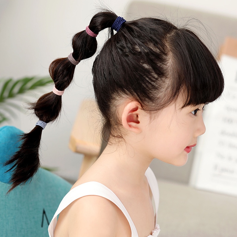 100ชิ้นแถบคาดผมยางยืดสีลูกกวาด - Baby Gear บทวิจารณ์และราคา